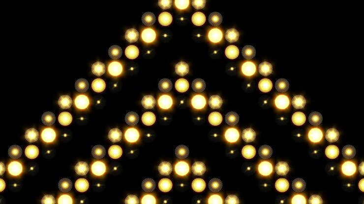 Sfondo di luci LED con motivo a frecce dorate che si muovono verso l'alto.