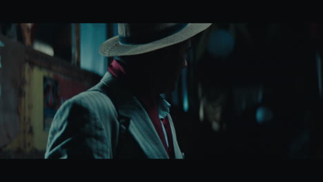 a man witch mustache in the empty gypsy circus camp at night