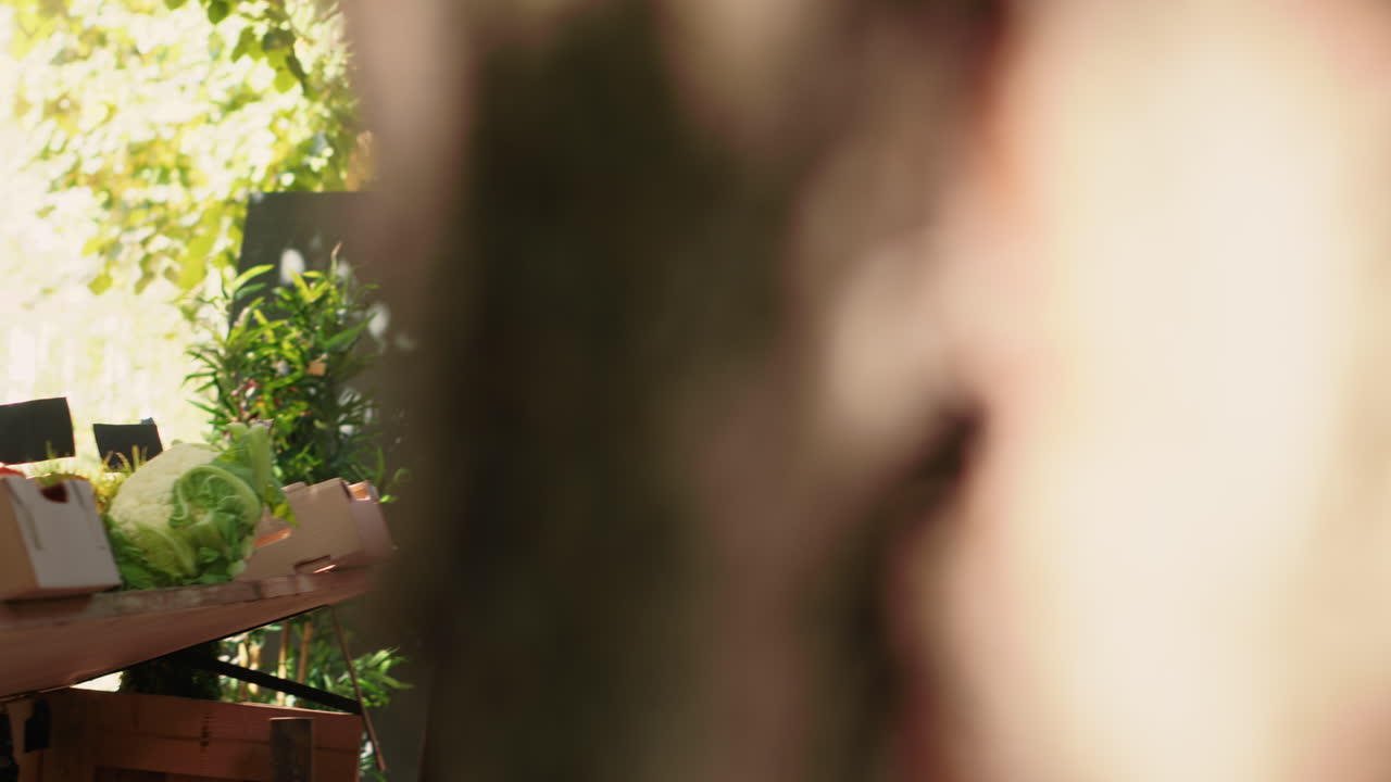People buying produce at a farmer's market