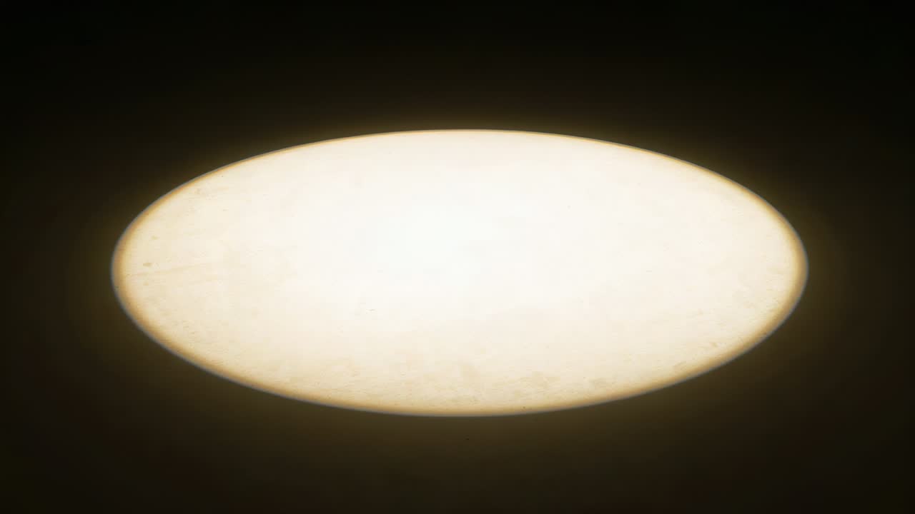 Growing round ceiling light fixture expanding over dark ceiling, dimmer raising power to light room