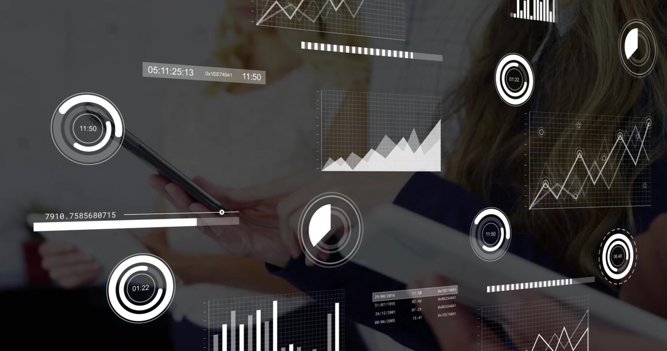 Business analyst lifting and tapping tablet, syncing phone and animating bar charts