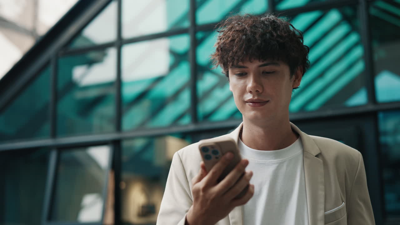 Man talking on mobile phone in the city