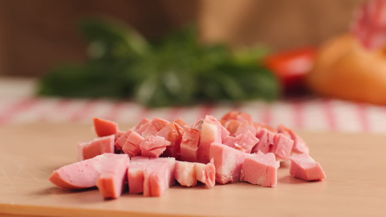 Ham italian mordatella, man Slices Of Traditional Italian antipasti mortadella sausage on a wooden cutting board, close up macro of chicken or turkey jamon, fat breakfast dish.