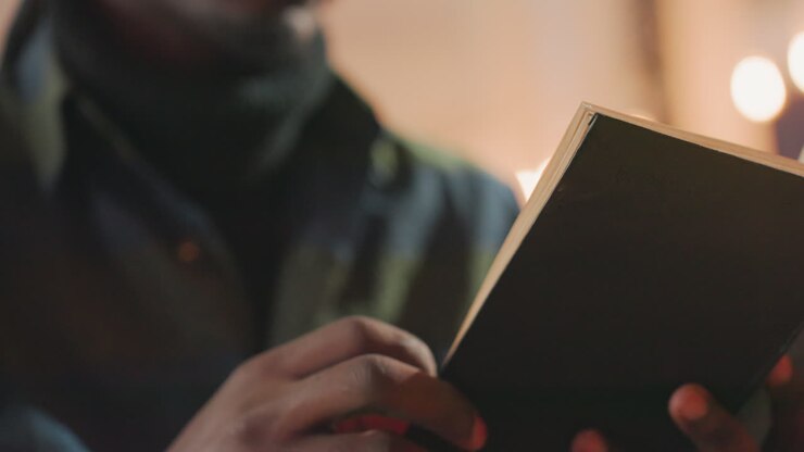 individual fingers delicately flipping through pages, detailed shot capturing careful finger placement on pages, closeup imagery showing precise finger actions as pages are being carefully turned