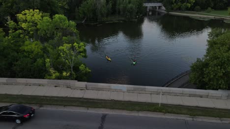 kayakers in lake calhound in minneapolis