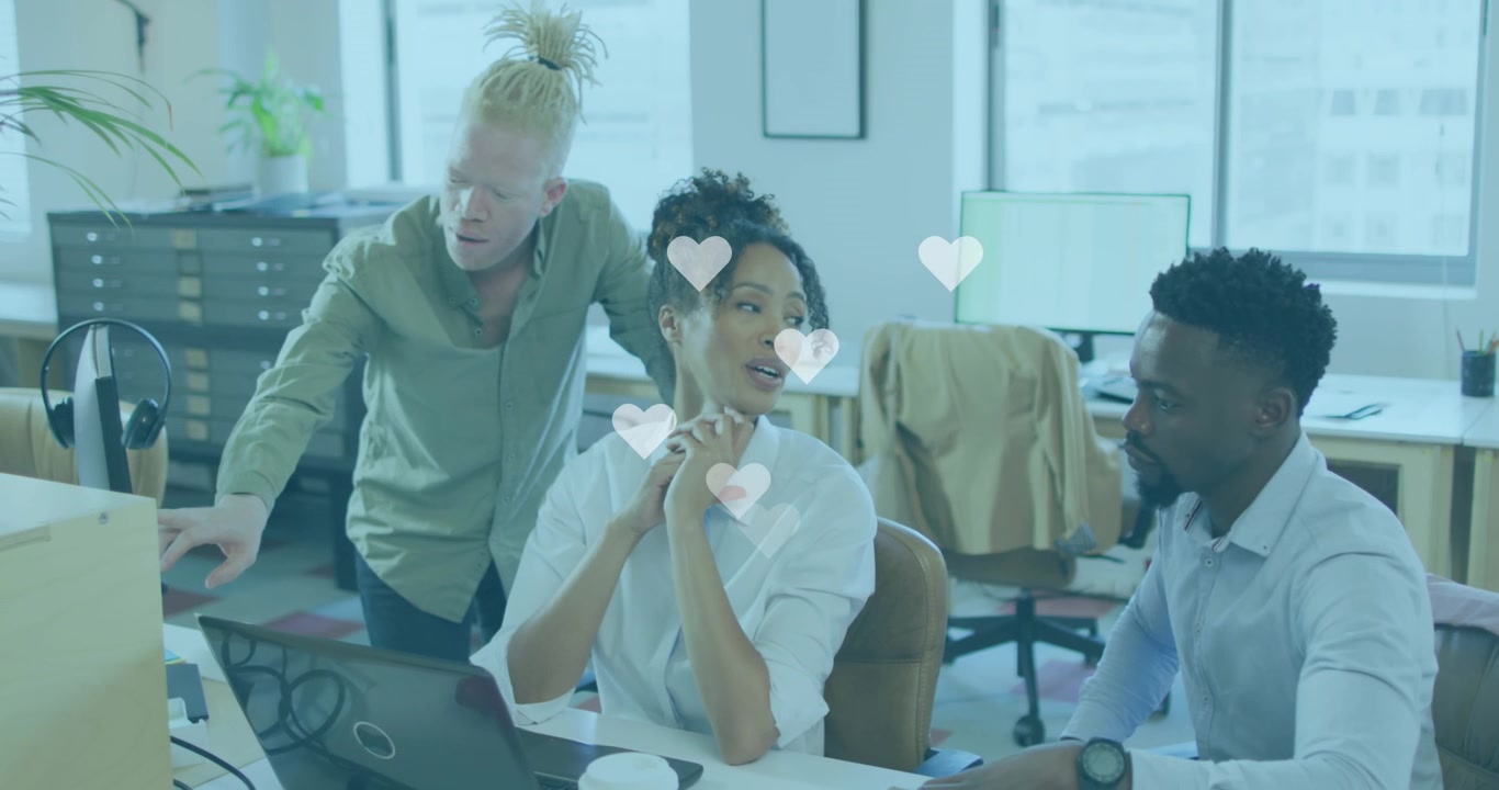 Animation of hearts over business people in office