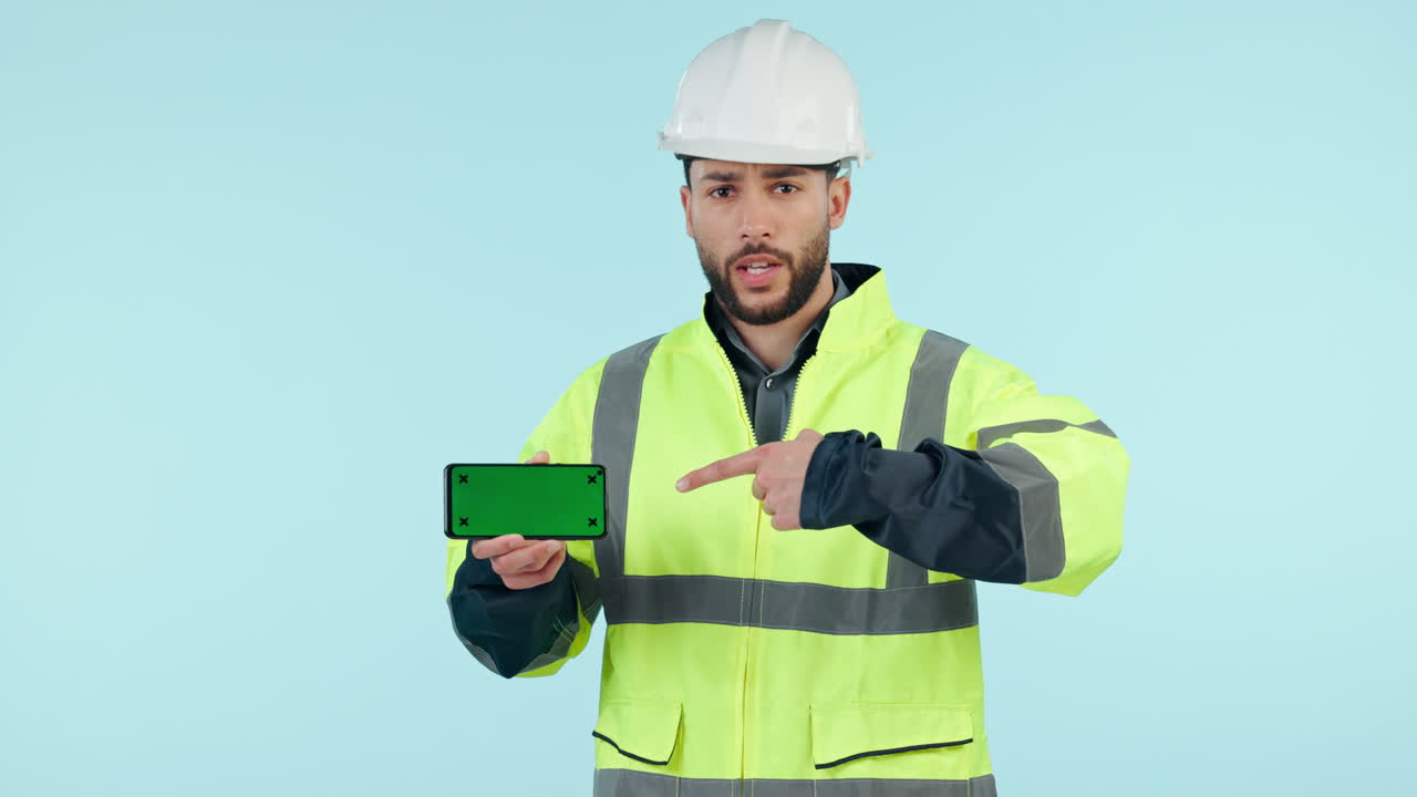 trabajador de la construcción, teléfono de pantalla verde