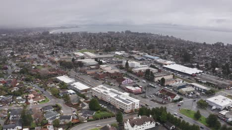 aerial wide panning shot of foggy santa cruz, california. 4k