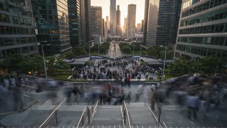 busy urban cityscape at sunset with crowded pedestrians