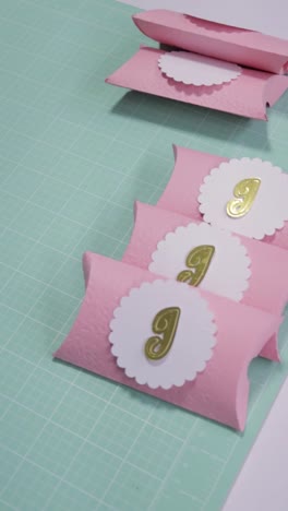 diy pink and gold pillow boxes with letter g