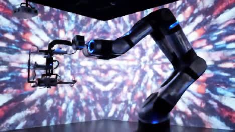 mesmerizing fusion of technology and art: a robotic arm dances against a vibrant, colorful backdrop in a stunning visual display