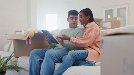 Smart-home,-man-and-woman-on-sofa-with-tablet