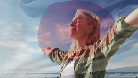 enjoying ocean breeze, woman with colorful abstract animation shapes overlay