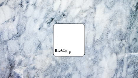 viernes negro en marco con textura de mármol