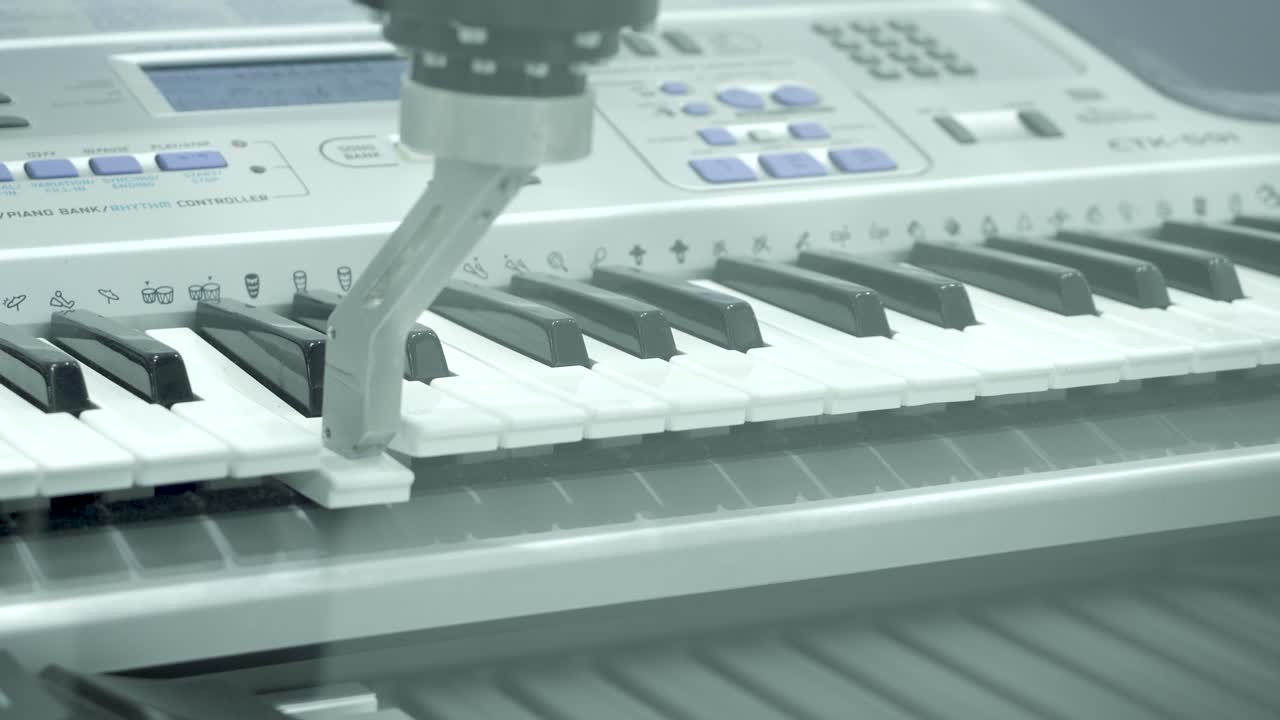 Close-up of an electronic keyboard with a controller