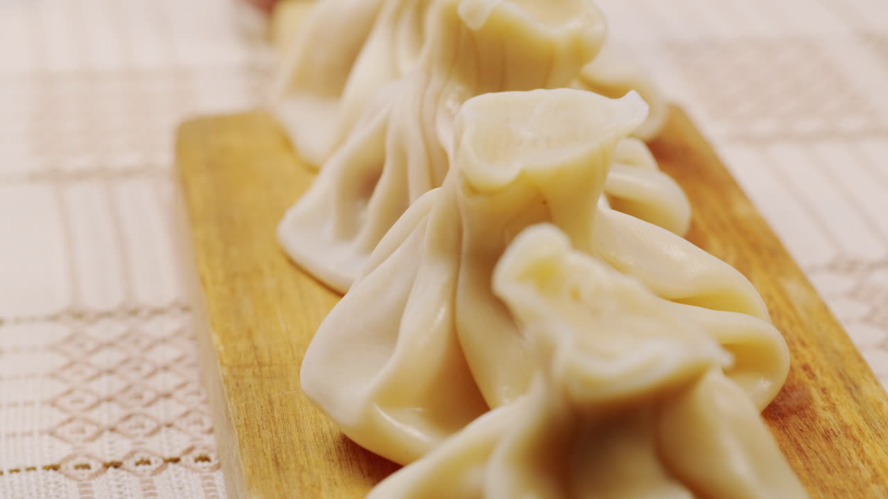 Khinkali on a Wooden Board