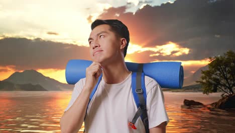 close up of asian male hiker with mountaineering backpack thinking about something and looking around then raising his index finger at a lake