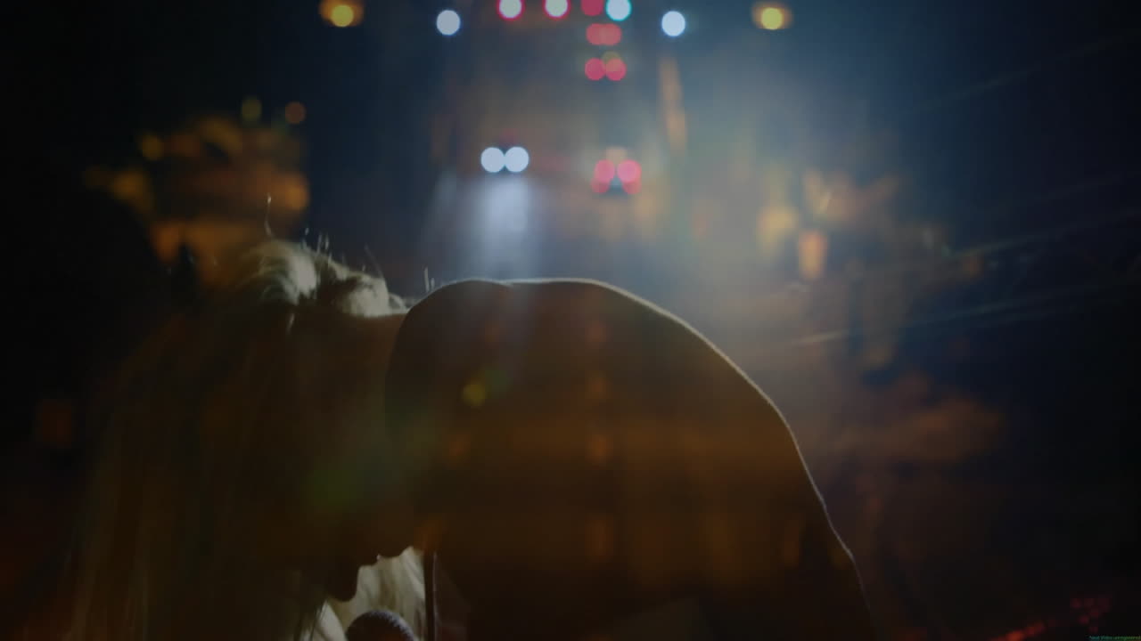 Singing into microphone, person over city lights animation