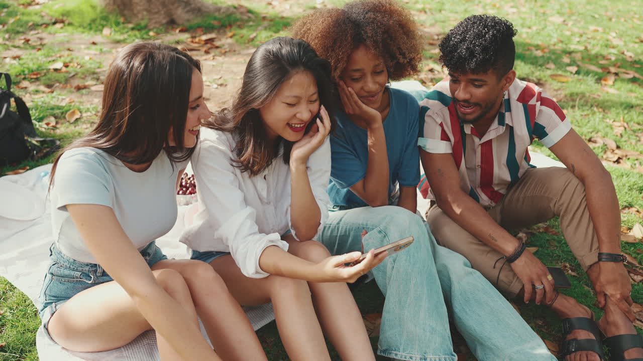 Group of friends enjoying a picnic in the park