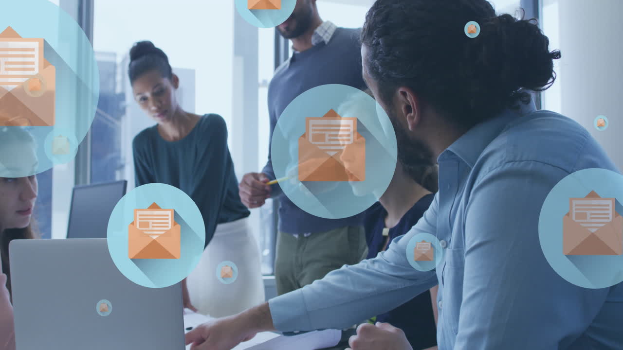 Animation of digital email icons over diverse business people in office