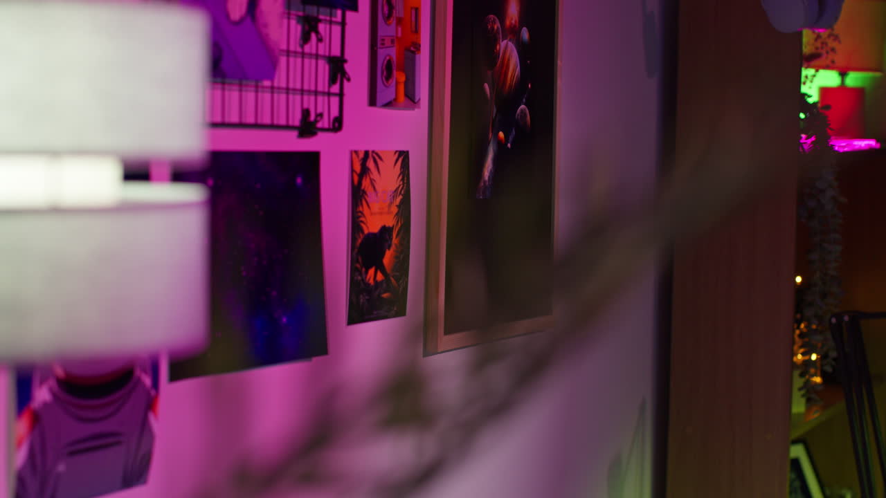 Close-up of a wall with art prints and decorations