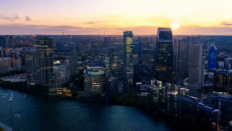 aerial view of a city skyline at sunset