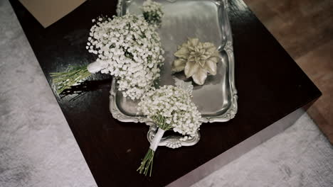 elegant floral arrangement on silver tray