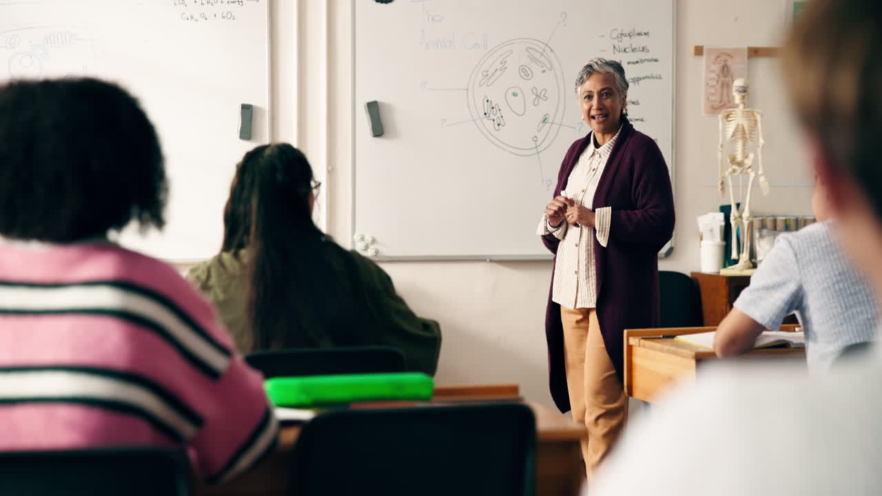 Teacher Explaining Biology to Students in Classroom