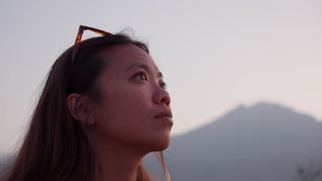 Relaxed-asian-woman-admiring-landscape-of-Savanna-Tianyar-in-Bali,-Indonesia