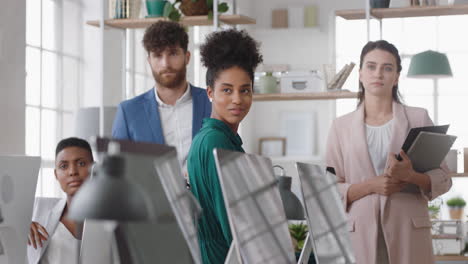 diverse-group-of-business-people-in-office-smiling-corporate-team-enjoying-teamwork-meeting