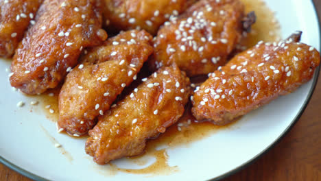 fried chicken with korean spicy sauce and white sesame