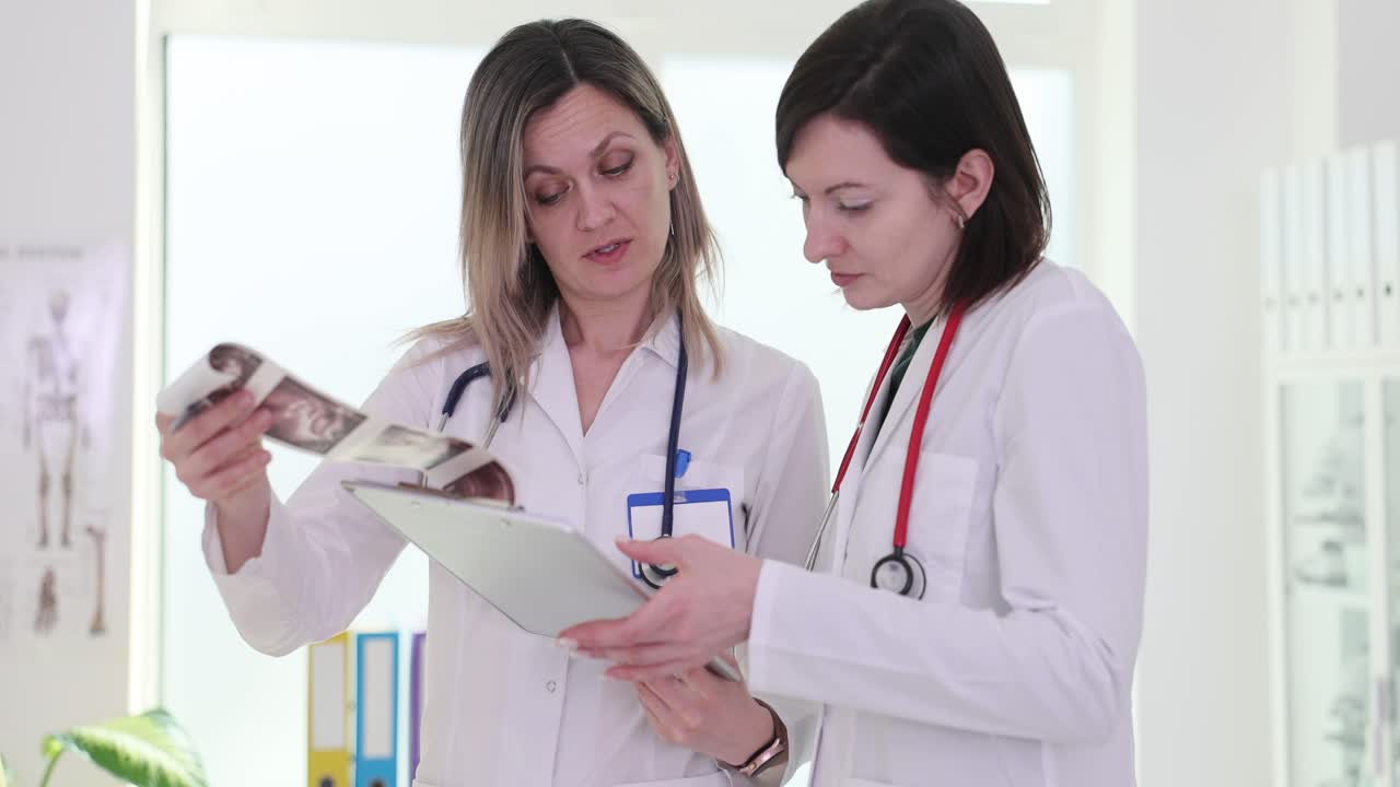 Doctors discussing medical results