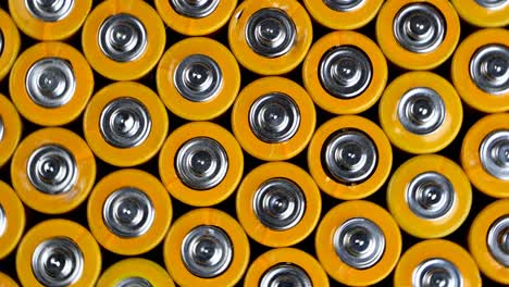 many used aa alkaline batteries, finger batteries in heap ready for recycling. harmful effects of planet earth.