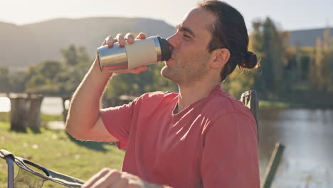 camping, coffee and man relax at a lake