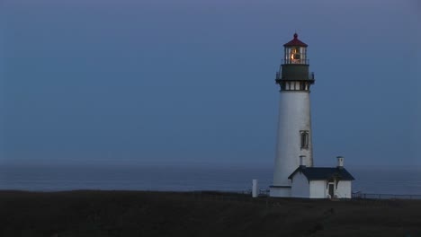 A-Beautiful-Blue-Sky-Is-The-Perfect-Backdrop-For-This-White-Lighthouse-And-The-Keeper\'S-Home