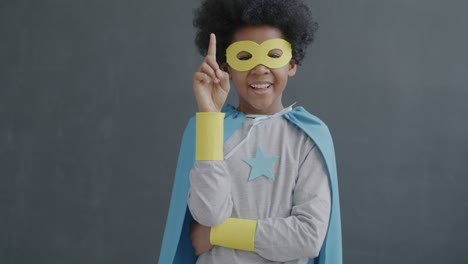 child dressed as superhero