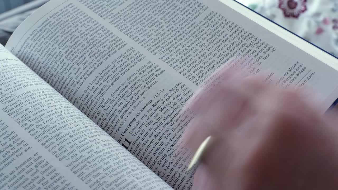 woman is scrolling and reading the bible