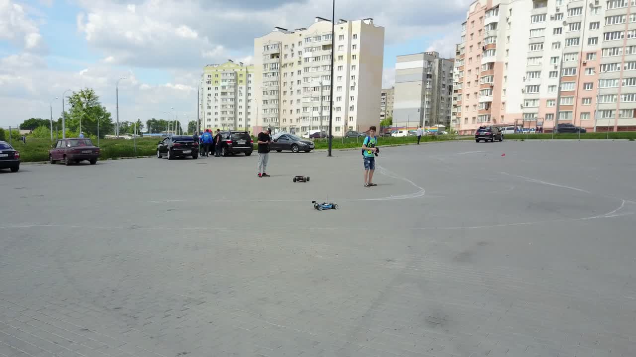 Sports Car On Radio Control. VINNITSA, UKRAINE - MAY 2017: Europe Day, hobby radio-controlled car racing on a road