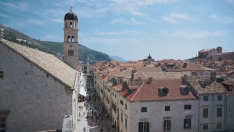 establishing slow pan shot of dubrovnik main street from rooftop