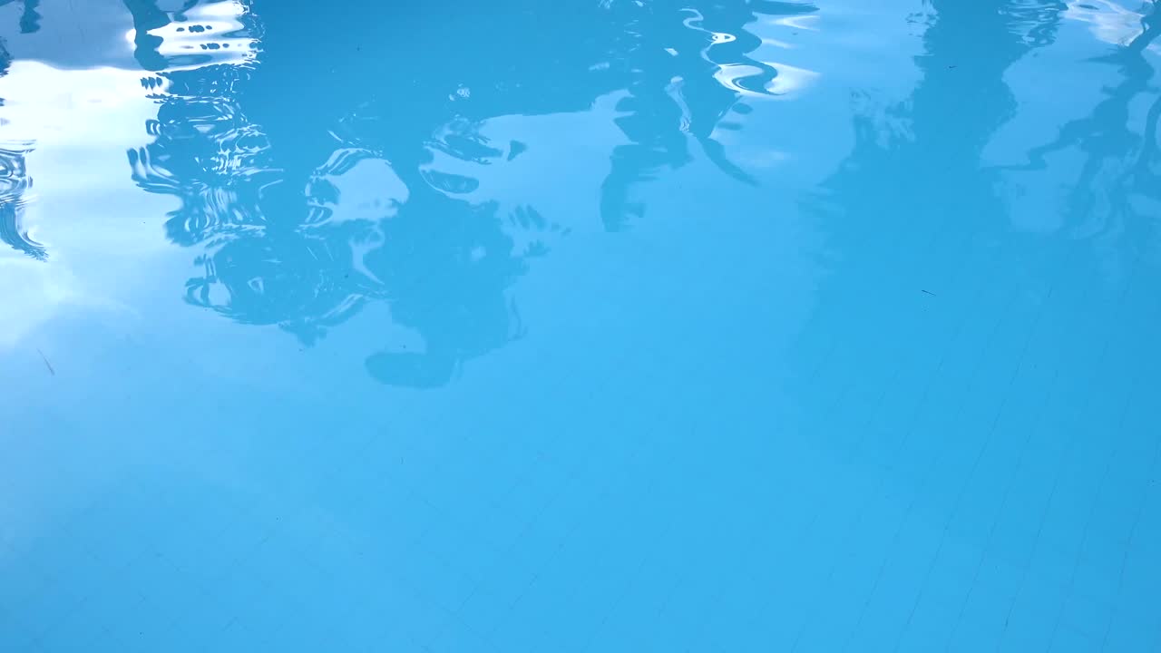 Blue clear water in swimming pool