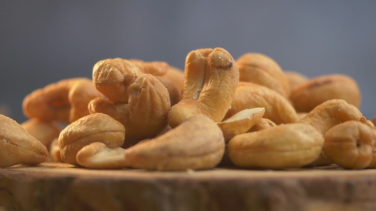 Roasted Cashews on a Wooden Board