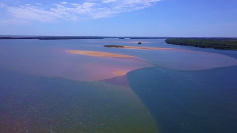 flight over sandbank in parana river, south america, natural border between argentina and paraguay