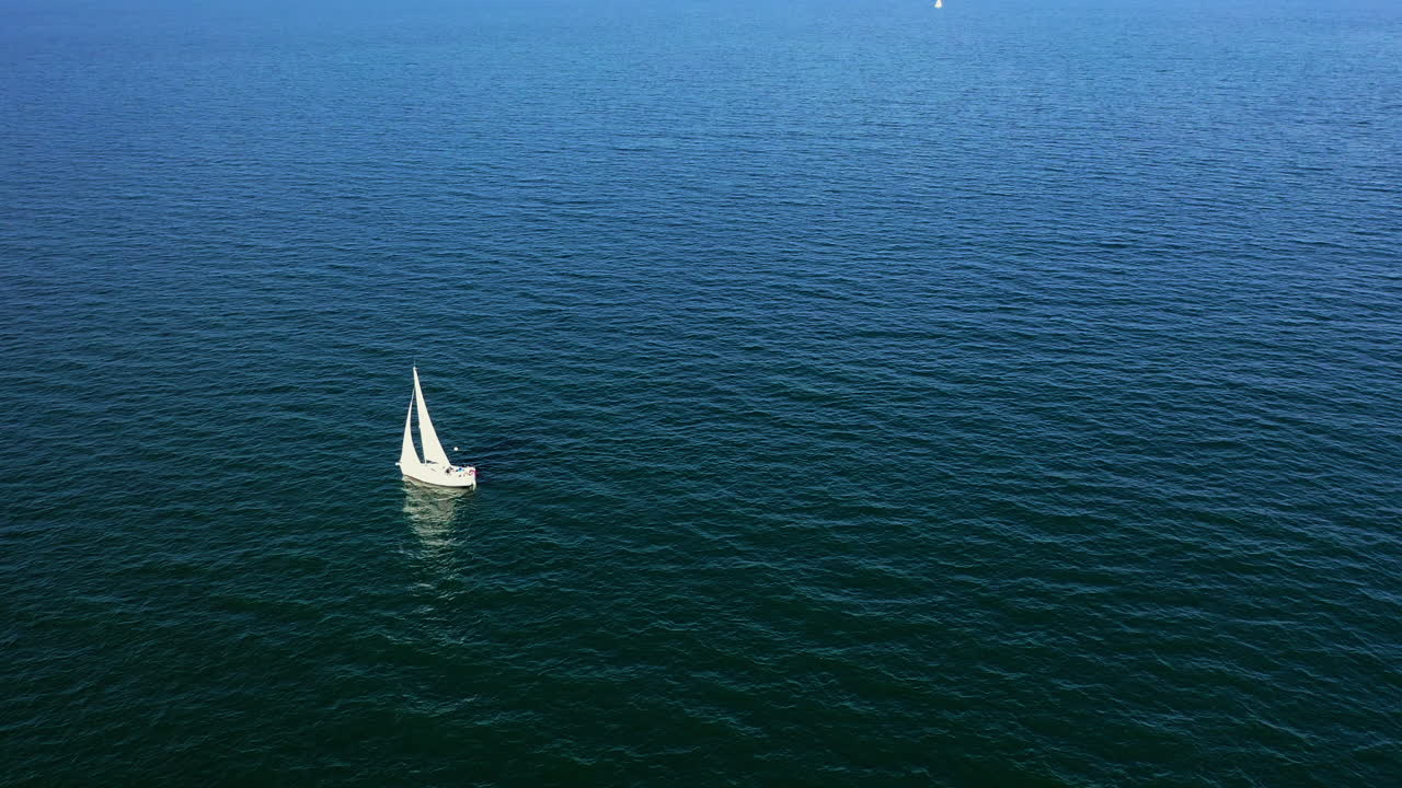 Lonely Sailboat on a Calm Ocean