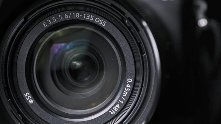 The Camera Lens Rotates, Lights Reflecting Off Glass, Robotic Camera Movement