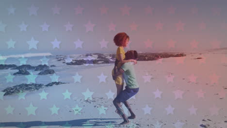 multiple blinking stars against african american couple dancing at the beach