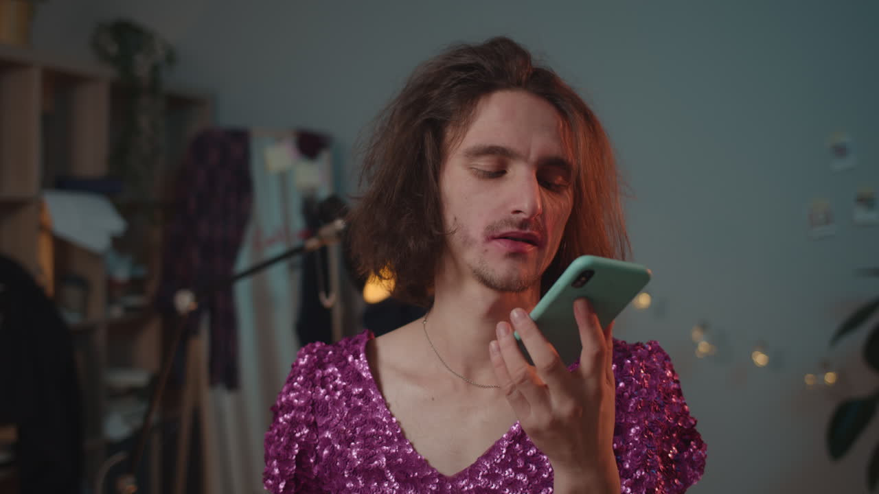 Person in sparkly dress calling on phone