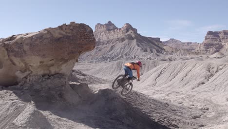 mountain biker jumping in front of camera with camera push