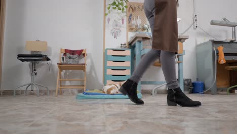 woman walking in a craft workshop