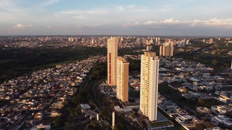 aerial circling residential buildings in bauru during golden hour, brazil