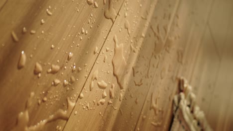 water droplets on wooden floor